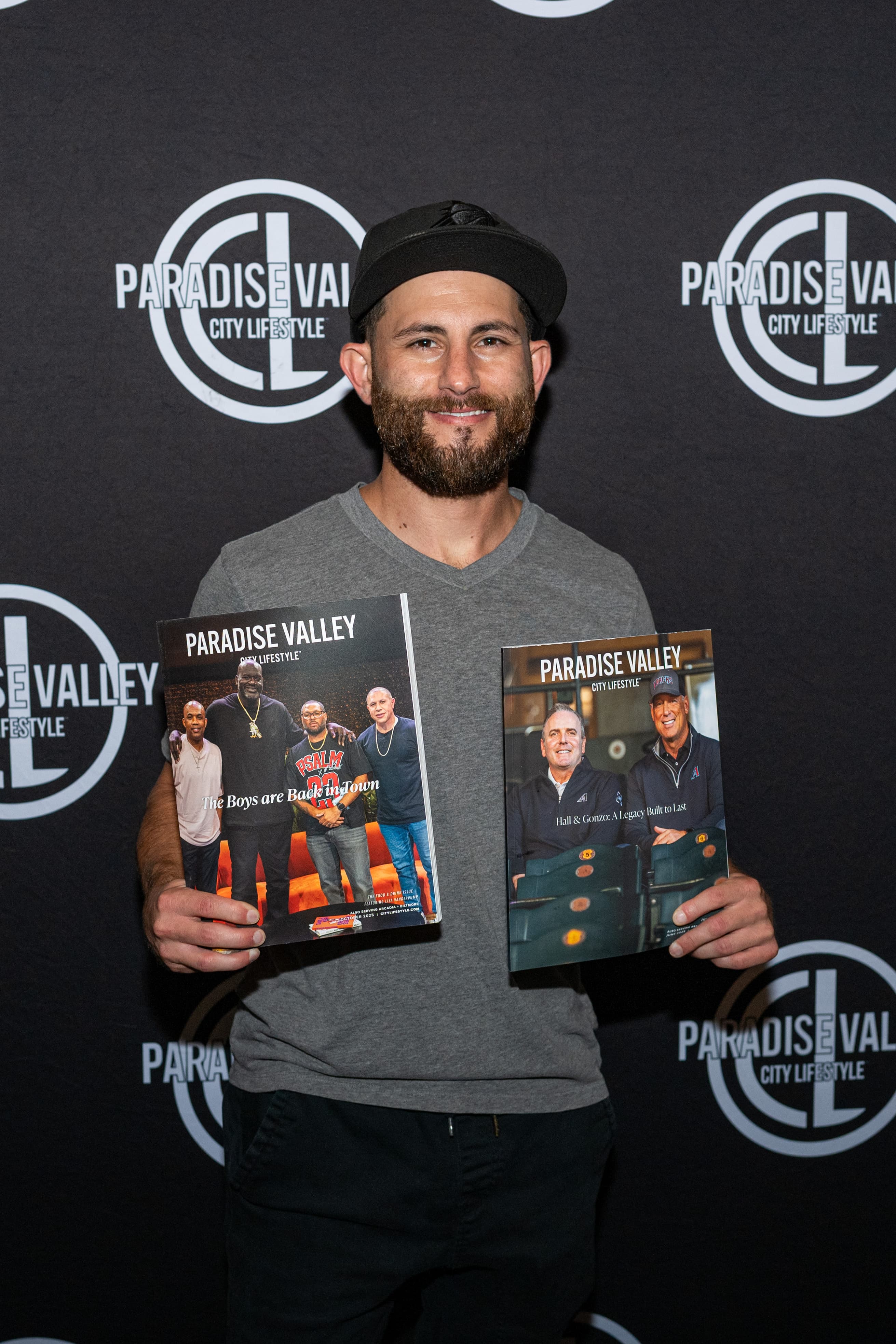 Barret Elengold holding Paradise Valley City Lifestyle features